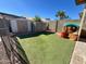 Artificial turf, storage shed and playset at 8791 W Kathleen Rd, Peoria, AZ 85382