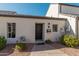 Exterior view of charming single-story home with dark door at 1116 E Belmont Ave, Phoenix, AZ 85020