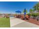 Community pool area with tables, chairs, and a hot tub at 120 E Rio Salado Pkwy # 201, Tempe, AZ 85281