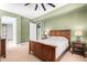 Bedroom with a wooden bed frame and access to bathroom at 120 E Rio Salado Pkwy # 201, Tempe, AZ 85281