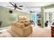 Tan sofas, wood coffee table, and fireplace in living room at 120 E Rio Salado Pkwy # 201, Tempe, AZ 85281