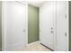 Apartment entry hallway with two doors and green walls at 120 E Rio Salado Pkwy # 201, Tempe, AZ 85281