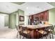 Modern kitchen with dark wood cabinets and breakfast bar at 120 E Rio Salado Pkwy # 201, Tempe, AZ 85281