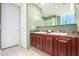 Bathroom with double sinks and granite countertop at 120 E Rio Salado Pkwy # 201, Tempe, AZ 85281