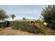 Backyard with shed and flowering bushes at 520 N Santa Barbara St, Mesa, AZ 85201