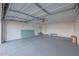 Bright and spacious garage with automatic door and epoxy floor at 4331 W Port Au Prince Ln, Glendale, AZ 85306