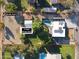 Aerial view showing house, pool, 5-stall horse barn and owned solar panels at 4331 W Port Au Prince Ln, Glendale, AZ 85306
