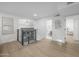 Lofted hallway with modern railing, hardwood floors, and bathroom view at 4331 W Port Au Prince Ln, Glendale, AZ 85306