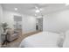 Spacious bedroom with a king bed, walk-in closet and an ensuite bathroom at 4331 W Port Au Prince Ln, Glendale, AZ 85306
