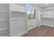 Large walk-in closet with ample shelving and hanging space at 4331 W Port Au Prince Ln, Glendale, AZ 85306