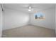 Spacious bedroom with window, ceiling fan and carpet at 4331 W Port Au Prince Ln, Glendale, AZ 85306