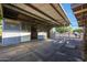 Horse stalls in a barn with a large door at 4331 W Port Au Prince Ln, Glendale, AZ 85306