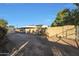 Large side yard with block wall, gate, and empty space at 4331 W Port Au Prince Ln, Glendale, AZ 85306