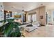 Spacious living room features a fireplace, large TV, and tile floors at 2549 W Shinnecock Way, Anthem, AZ 85086