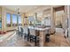 Bright kitchen with large island, stainless steel appliances, and views from the window at 2549 W Shinnecock Way, Anthem, AZ 85086