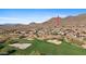 Community overview showing houses and a golf course at 2549 W Shinnecock Way, Anthem, AZ 85086