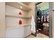 Bathroom with built-in shelving and a large walk-in closet at 2549 W Shinnecock Way, Anthem, AZ 85086