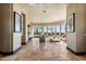 Open concept living room with tile floors and views at 2549 W Shinnecock Way, Anthem, AZ 85086