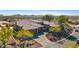Single story home with a large driveway and desert landscaping at 2549 W Shinnecock Way, Anthem, AZ 85086