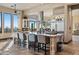 Bright kitchen with large island, stainless steel appliances, and views from the window at 2549 W Shinnecock Way, Anthem, AZ 85086