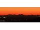 Scenic mountain range view at sunset at 2549 W Shinnecock Way, Anthem, AZ 85086