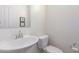 Clean and updated bathroom with white vanity and toilet at 2326 W Gloria Ln, Phoenix, AZ 85085