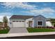 One-story home with attached garage and landscaped yard at 1427 E Cherrywood Pl, Chandler, AZ 85249