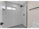 Clean bathroom with a walk-in shower and modern fixtures at 2330 E Cortez St, Phoenix, AZ 85028