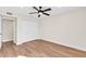 Well-lit bedroom with double-door closet and hardwood floors at 2330 E Cortez St, Phoenix, AZ 85028