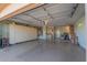 Spacious garage with ample storage cabinets at 14113 W Via Montoya Dr, Sun City West, AZ 85375