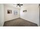 Charming bedroom with ceiling fan and carpet at 1918 N 22Nd Pl, Phoenix, AZ 85006