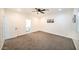 Bright bedroom with ceiling fan and carpet at 1918 N 22Nd Pl, Phoenix, AZ 85006