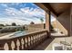 Private balcony overlooking the pool and backyard at 19915 E Sonoqui Blvd, Queen Creek, AZ 85142