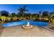 Luxury backyard featuring a kidney-shaped pool and fire pit at 2086 E Mead Dr, Gilbert, AZ 85298