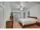 Spacious bedroom with wood flooring and sliding glass doors at 218 E Sunburst Ln, Tempe, AZ 85284