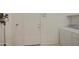 Laundry room with washer, dryer, and extra storage at 218 E Sunburst Ln, Tempe, AZ 85284