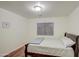 Bright bedroom with wood flooring and a double bed at 218 E Sunburst Ln, Tempe, AZ 85284