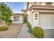 Front yard with walkway leading to the entrance and garage at 218 E Sunburst Ln, Tempe, AZ 85284