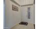 Bright entryway with tile flooring and access to the living room at 218 E Sunburst Ln, Tempe, AZ 85284
