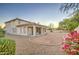 Back exterior view of house with large backyard at 218 E Sunburst Ln, Tempe, AZ 85284