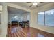 Spacious living room with hardwood floors and a view of the entryway at 218 E Sunburst Ln, Tempe, AZ 85284
