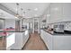 Modern kitchen with white cabinets and a large island at 11407 W Duane Ln, Peoria, AZ 85383