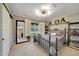 Well-lit bedroom with a comfortable bed and built-in shelving at 6839 W Pershing Ave, Peoria, AZ 85381