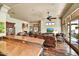 Kitchen with granite countertops and breakfast bar overlooking the living room at 3219 S Silverberry Ct, Gold Canyon, AZ 85118