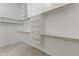 Large walk-in closet with shelving and hanging rods at 6440 E Odessa St, Mesa, AZ 85215