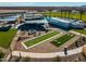 Aerial view of community pool, bocce ball, and cornhole at 932 W Macaw Dr, Queen Creek, AZ 85142