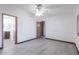 Bright bedroom with vinyl flooring and a large closet at 9302 E Broadway Rd # 9, Mesa, AZ 85208