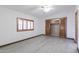 Spacious bedroom with wood closet doors and vinyl flooring at 9302 E Broadway Rd # 9, Mesa, AZ 85208