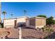 Backyard with small shed and gravel landscaping at 9302 E Broadway Rd # 9, Mesa, AZ 85208