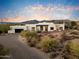 Stunning desert landscape surrounds this modern home at 8942 E Stagecoach Pass, Carefree, AZ 85377